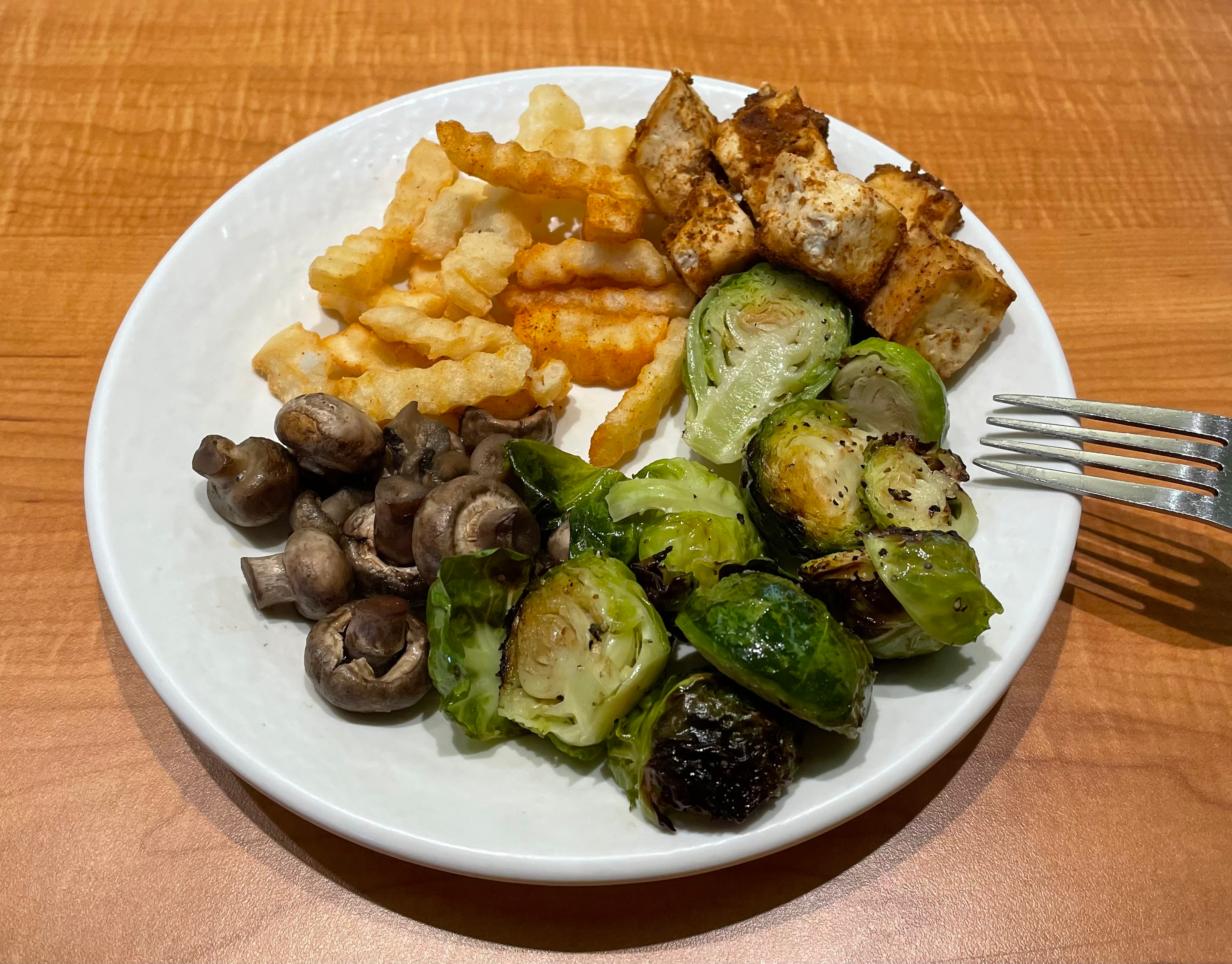 Brussel sprouts, fries, mushrooms, and tofu