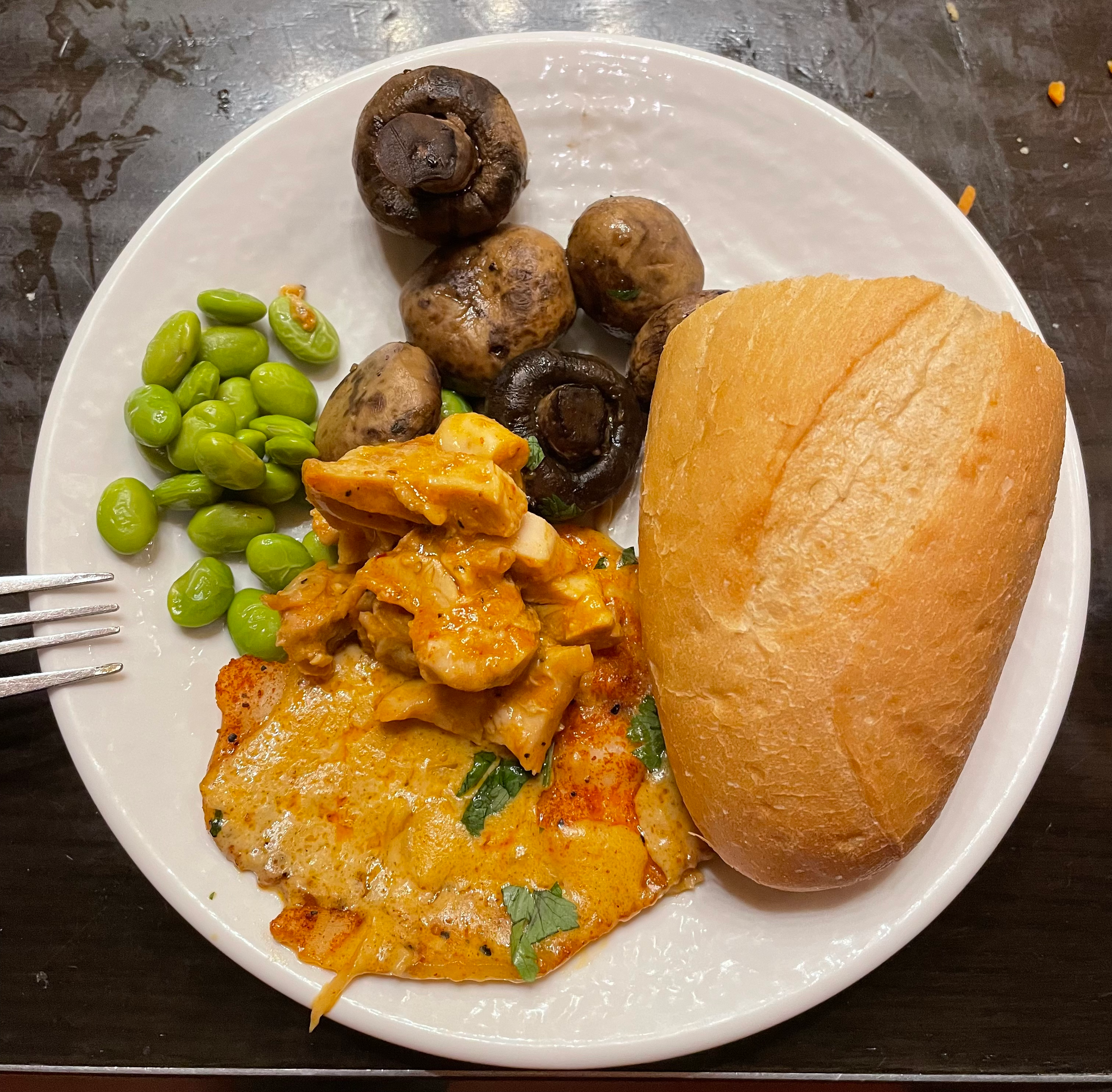 Chicken with bread (??), edamame, and mushrooms