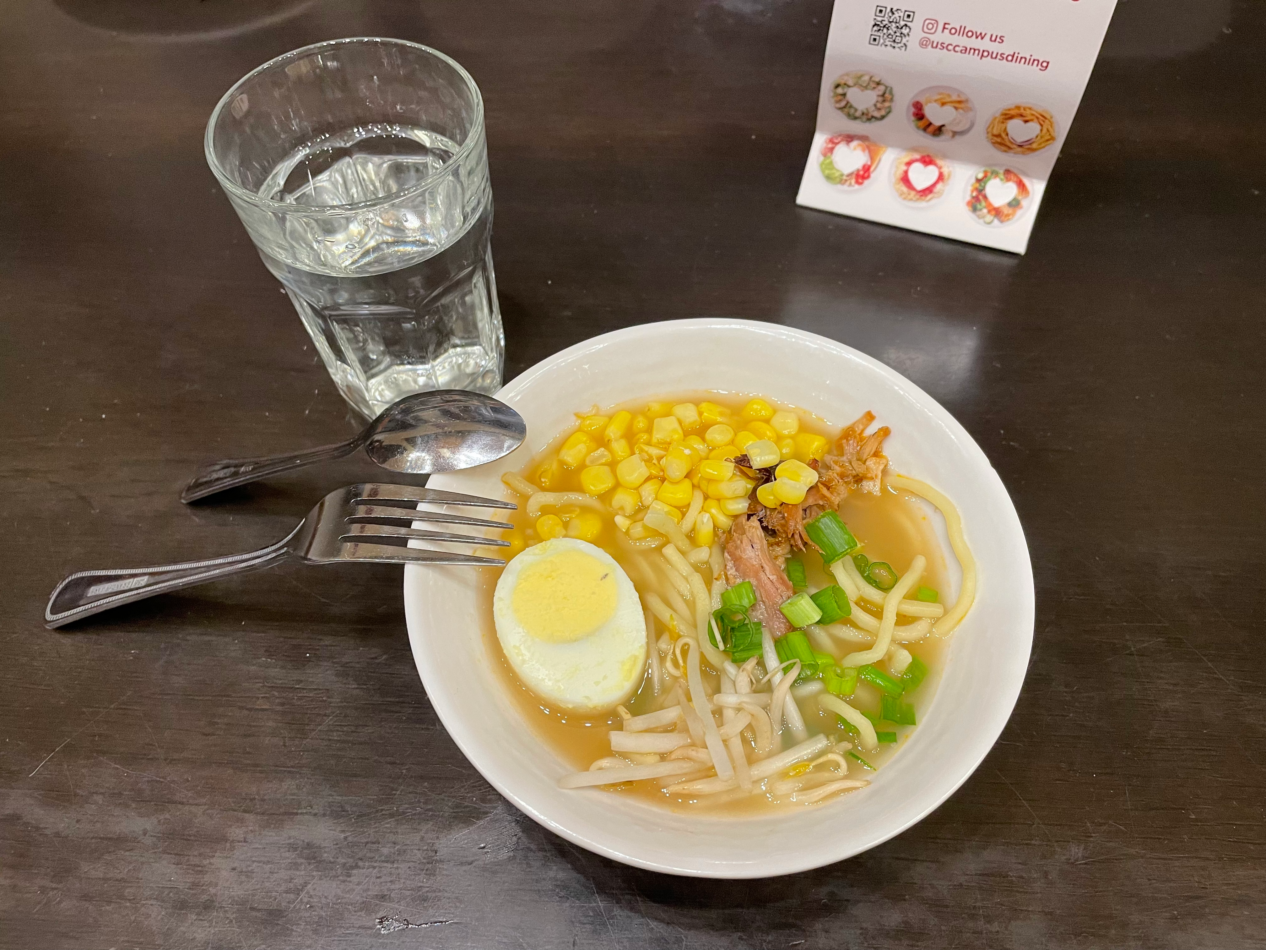 Miso ramen, with corn, pork, bean sprouts, green onion, egg, and strange noodles